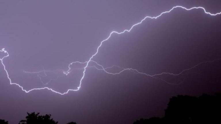 Man struck by lightning while driving on highway in Moreton Bay storm