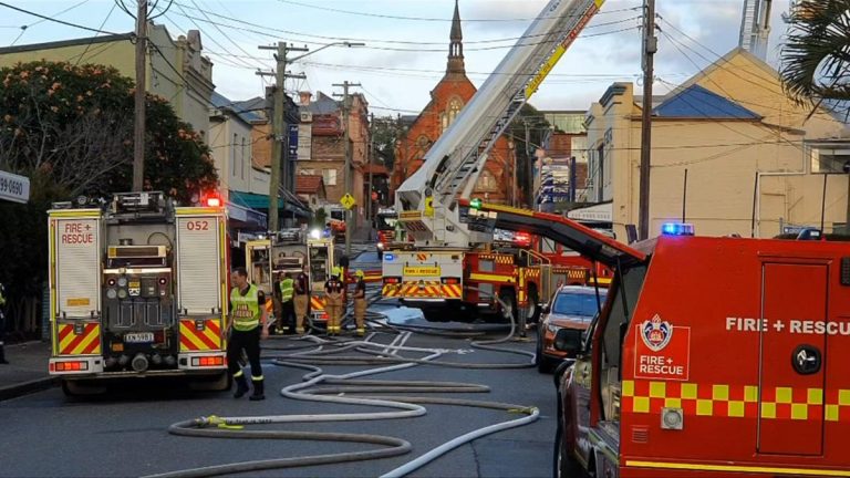 E-bike factory in Croydon, Sydney engulfed by flames as firefighters issue lithium-ion battery warning